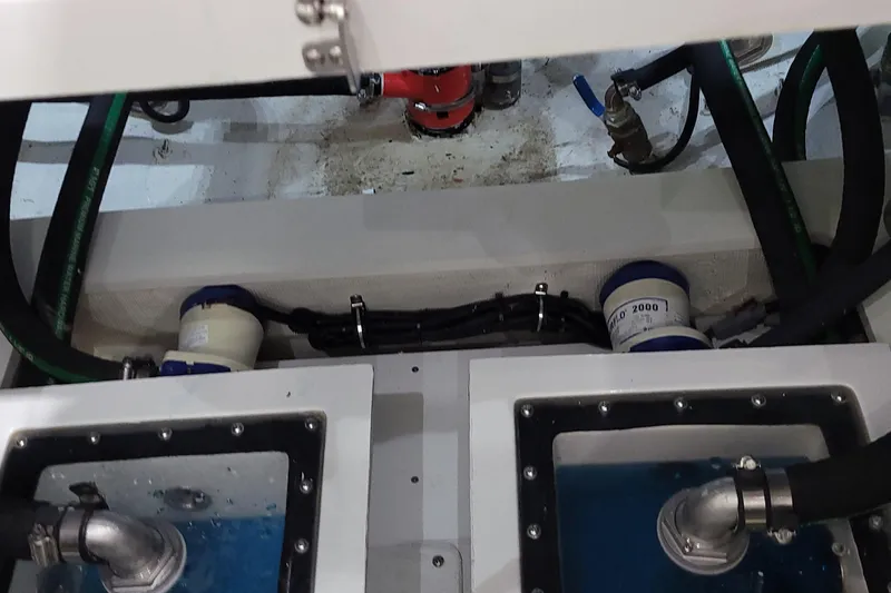 Slide: The Image of Engine compartment of 2023 HCB 39 FT Speciale with visible hoses and components. - 42