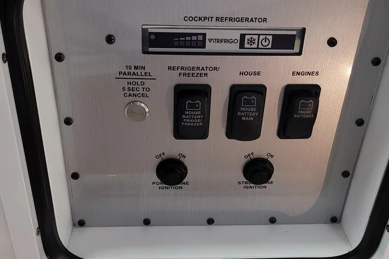 Slide: The Image of Control panel of 2023 HCB 39 FT Speciale with refrigerator and battery switches. - 44