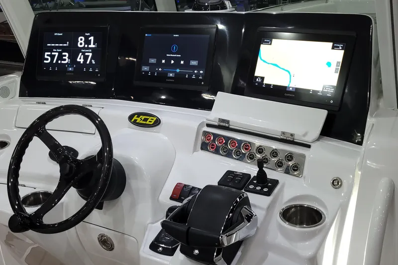 Slide: The Image of Control panel of 2023 HCB 39 FT Speciale boat with advanced navigation displays. - 46