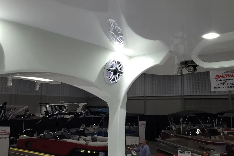 Slide: The Image of 2023 HCB 39 FT Speciale boat interior with speakers at a boat show. - 48