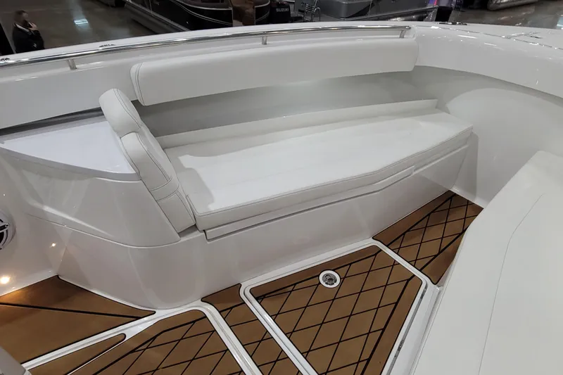 Slide: The Image of 2023 HCB 39 FT Speciale boat interior with white seating and patterned flooring. - 53