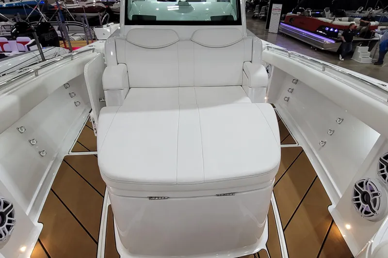 Slide: The Image of Luxurious seating on 2023 HCB 39 FT Speciale boat, featuring white upholstery and modern design. - 55