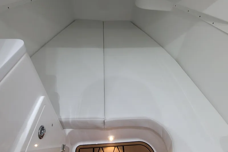 Slide: The Image of Interior cabin of 2023 HCB 39 FT Speciale, featuring sleek white upholstery. - 62