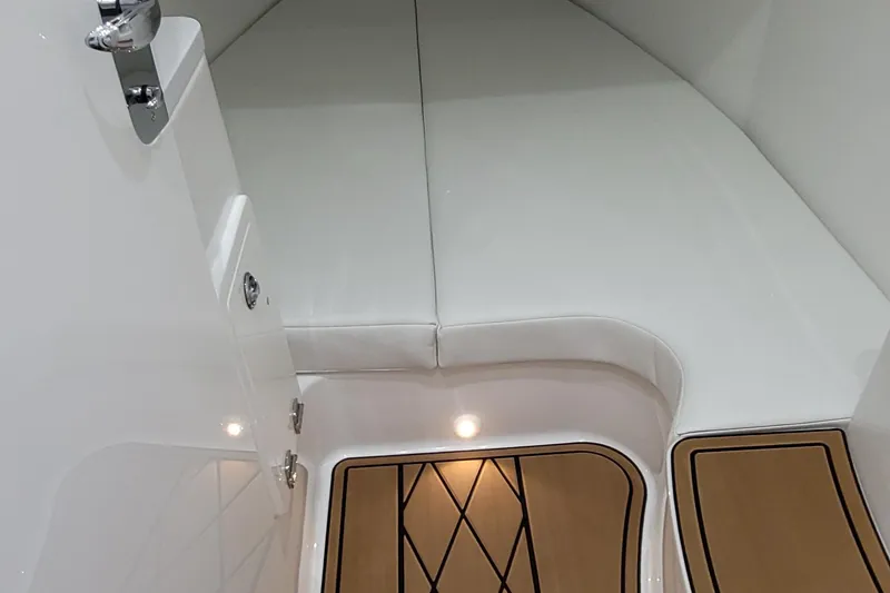 Slide: The Image of Interior cabin of 2023 HCB 39 FT Speciale with sleek white seating and wooden flooring. - 65