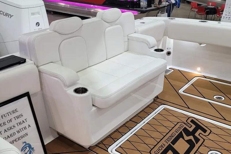 Slide: The Image of 2023 HCB 39 FT Speciale boat interior with white seating and teak flooring. - 8