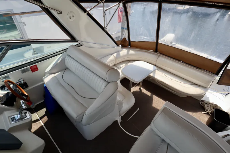 Slide: The Image of Interior of a 2000 Cruisers Yachts 3870 with leather seating. - 17