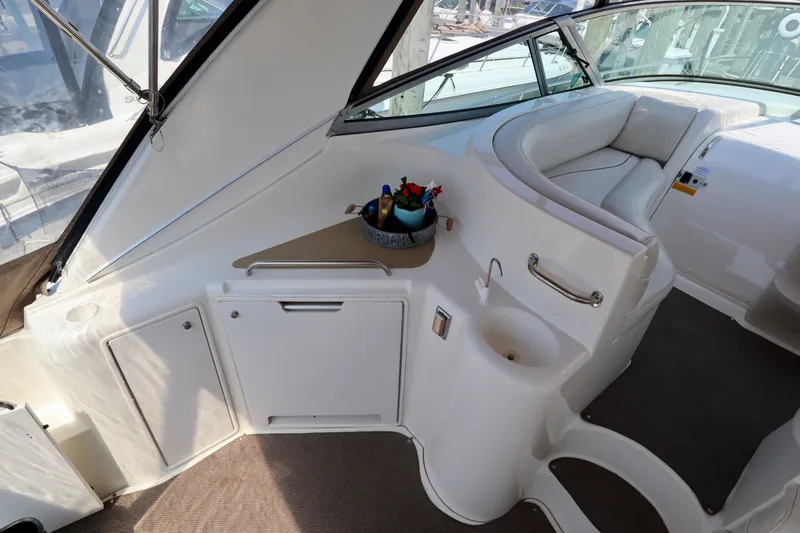 Slide: The Image of Interior of a 2000 Cruisers Yachts 3870 with seating area. - 18