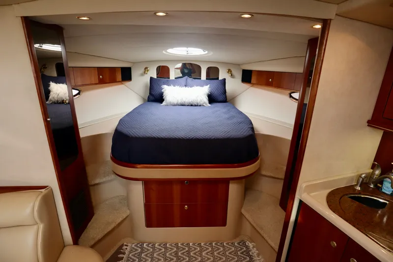Slide: The Image of Interior of 2000 Cruisers Yachts 3870 with cozy bed. - 3