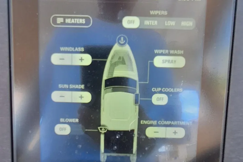 Slide: The Image of Touchscreen control panel of a 2021 Aviara AV32 OB boat, displaying various system settings. - 26