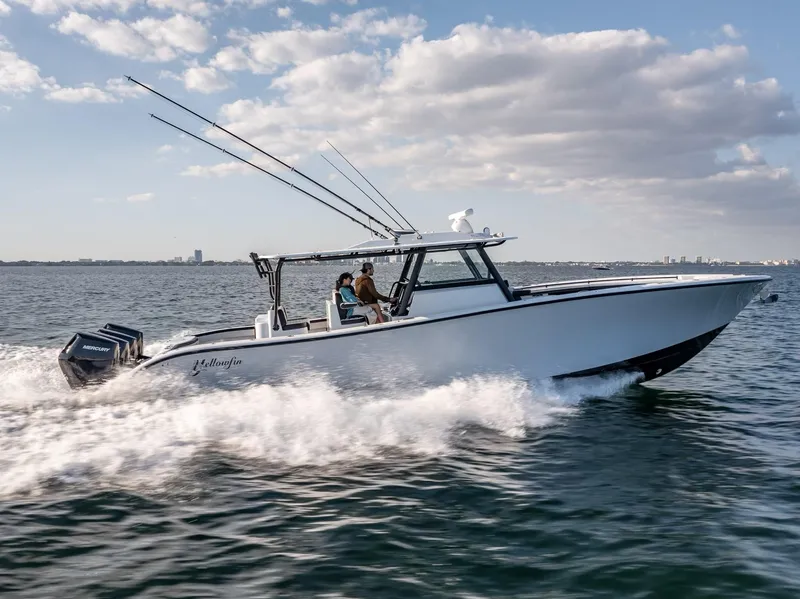 Slide: The Image of 2024 Yellowfin 42 boat cruising on open water. - 15