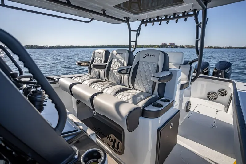 Slide: The Image of 2024 Yellowfin 42 boat with luxurious seating on open water. - 40