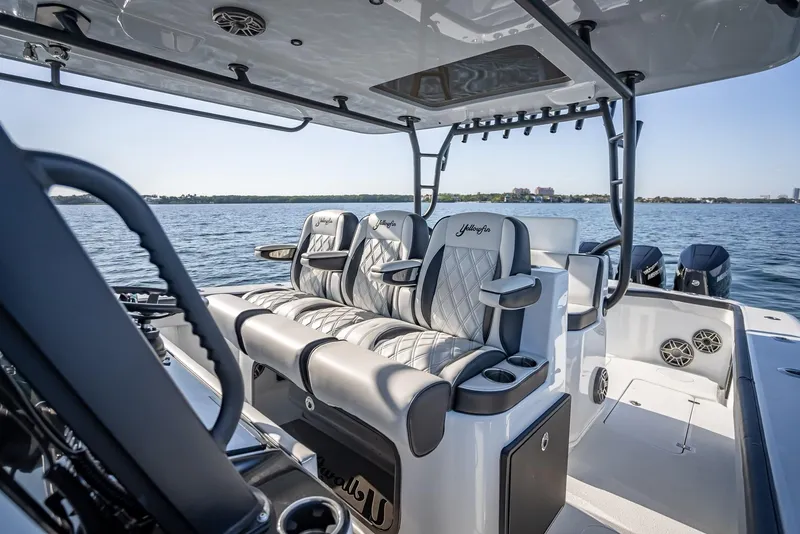 Slide: The Image of 2024 Yellowfin 42 boat with luxurious seating on open water. - 41