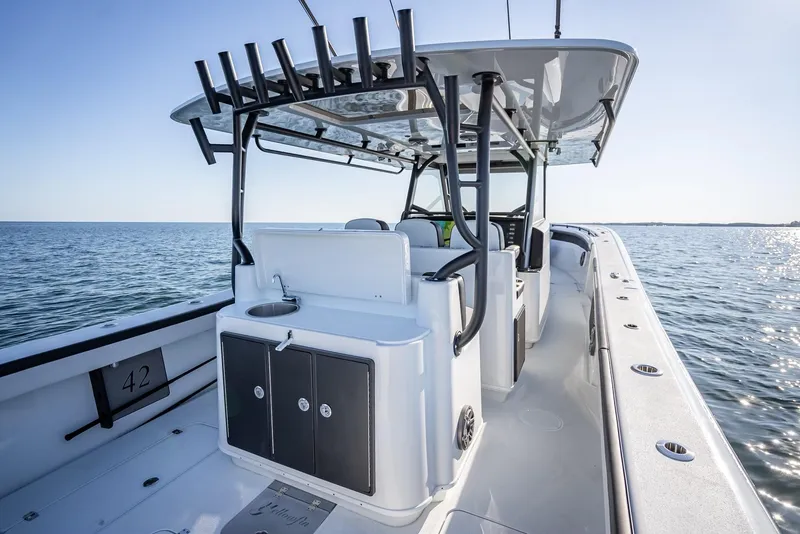 Slide: The Image of 2024 Yellowfin 42 boat interior on open water. - 45