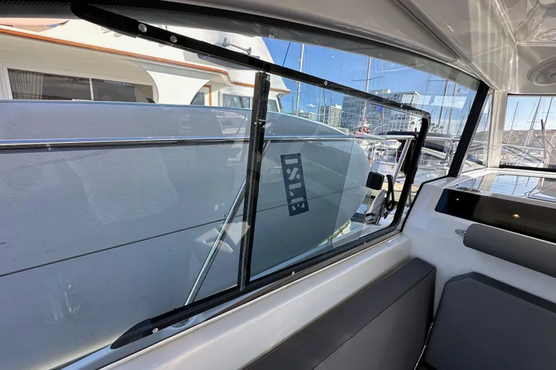 Slide: The Image of Interior view of 2023 Beneteau Antares 11 Fly, showcasing sleek window design. - 33