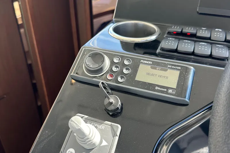 Slide: The Image of Control panel of 2023 Beneteau Antares 11 Fly with Fusion MS-RA70N audio system. - 39