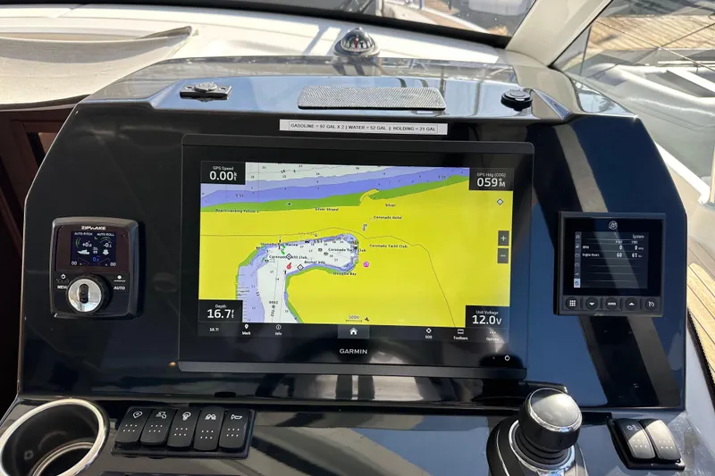 Slide: The Image of Beneteau Antares 11 Fly 2023 dashboard with navigation display and controls. - 41