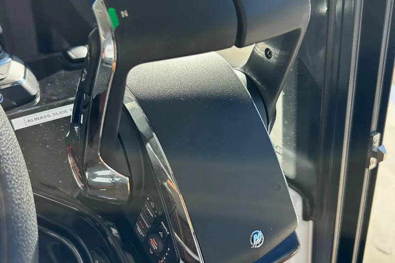 Slide: The Image of Close-up of throttle controls on 2023 Beneteau Antares 11 Fly boat. - 44