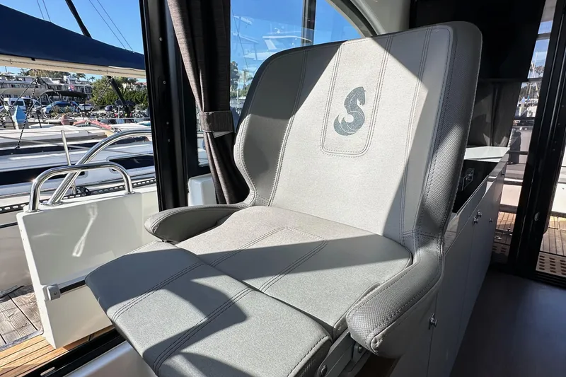 Slide: The Image of Captain's seat on 2023 Beneteau Antares 11 Fly, featuring sleek design and comfort. - 45