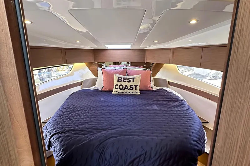 Slide: The Image of Luxurious cabin interior of 2023 Beneteau Antares 11 Fly with cozy bedding and stylish decor. - 62