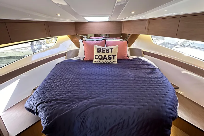 Slide: The Image of Luxurious cabin interior of 2023 Beneteau Antares 11 Fly with cozy bedding and stylish decor. - 63