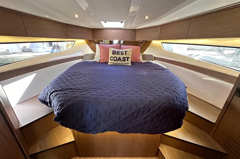 Slide: The Image of Luxurious cabin interior of 2023 Beneteau Antares 11 Fly with cozy bedding. - 64