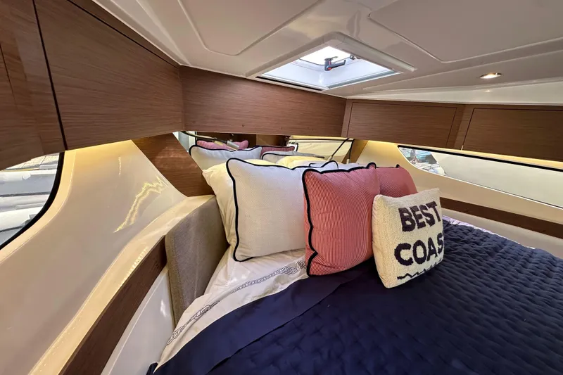 Slide: The Image of Luxurious cabin interior of 2023 Beneteau Antares 11 Fly with stylish bedding and cushions. - 67