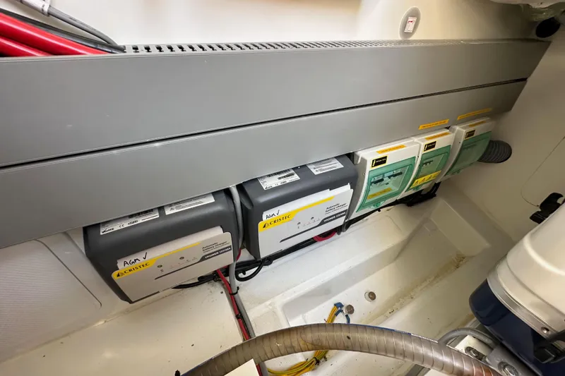 Slide: The Image of Electrical system of 2023 Beneteau Antares 11 Fly, featuring battery chargers and wiring. - 93