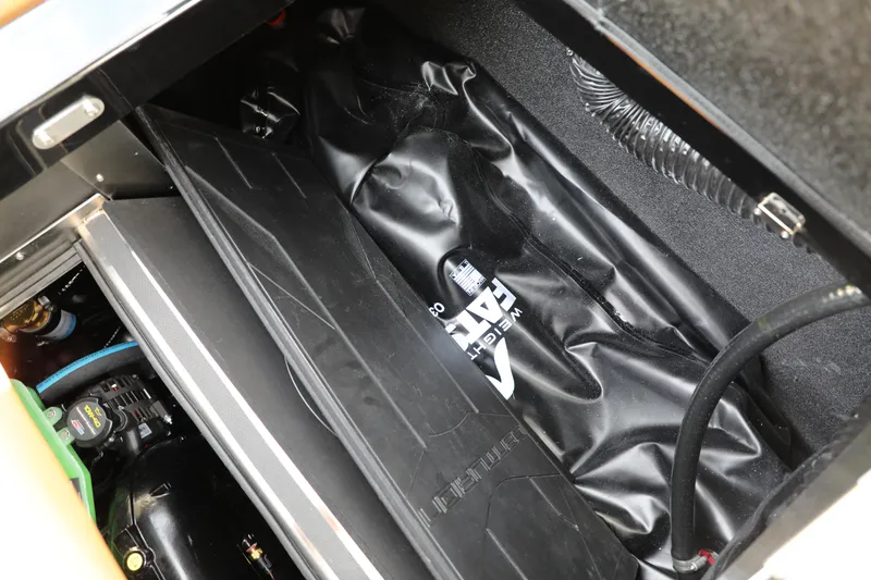 Slide: The Image of Interior view of 2025 Centurion Nv213 boat showing ballast system components. - 36