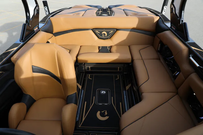 Slide: The Image of Luxurious interior of 2025 Centurion Nv213 boat with tan leather seating and sleek design. - 39