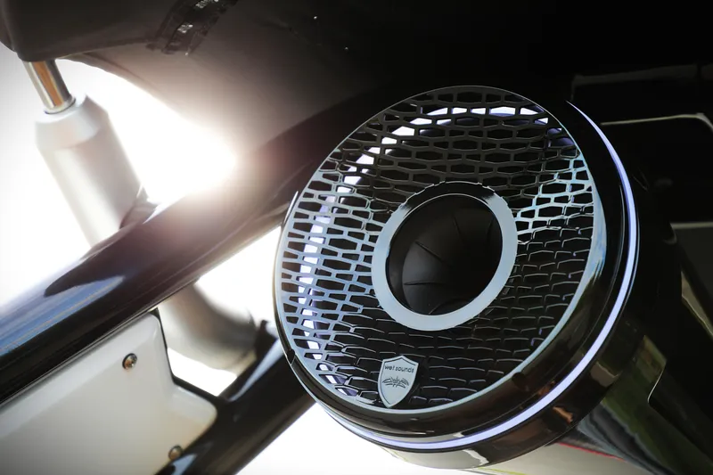 Slide: The Image of Close-up of Centurion Nv213 2025 boat speaker with sunlight in background. - 4