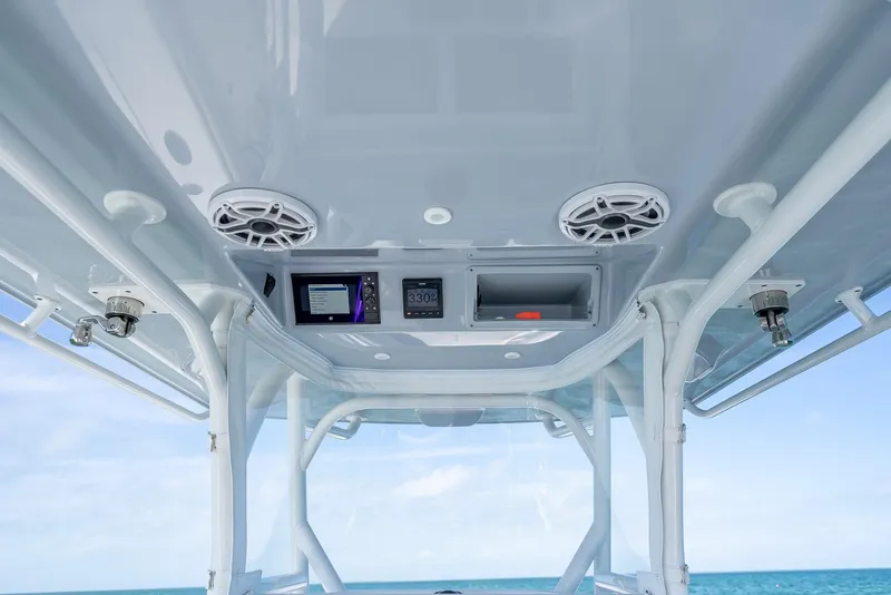 Slide: The Image of 2020 Yellowfin 34 boat interior with speakers and ocean view. - 34
