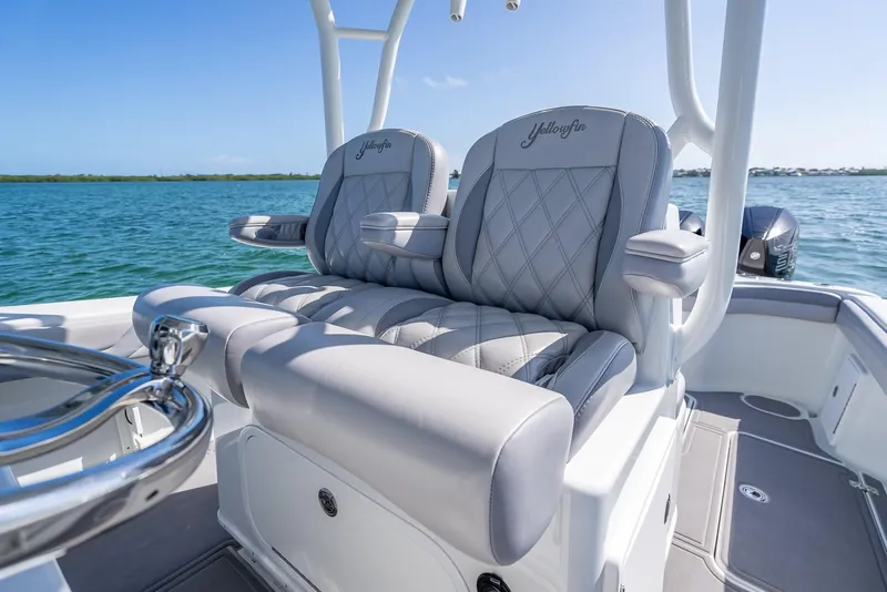 Slide: The Image of 2020 Yellowfin 34 boat with luxurious seating on a sunny day. - 37