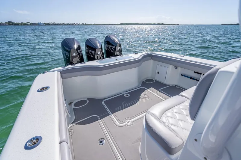Slide: The Image of 2020 Yellowfin 34 boat with triple engines on open water. - 40