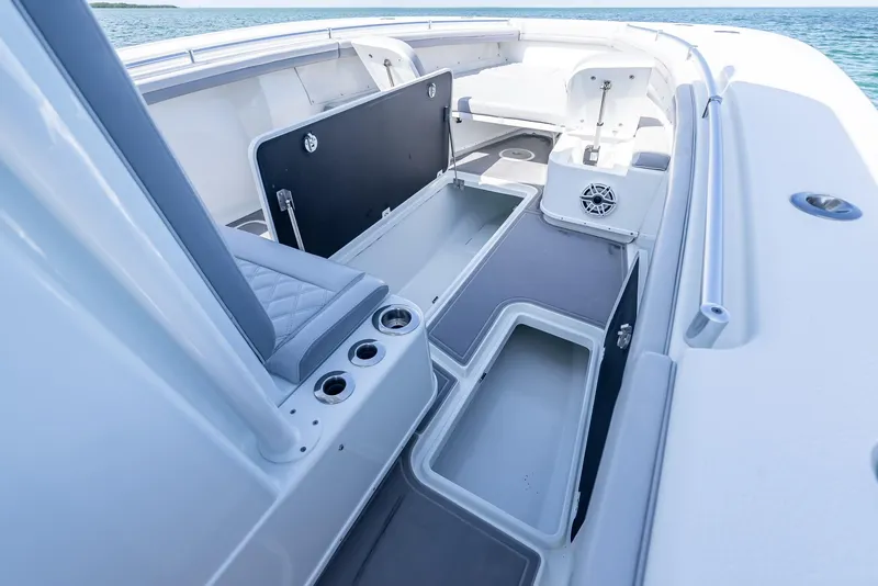 Slide: The Image of 2020 Yellowfin 34 boat interior with open storage compartments and seating. - 46