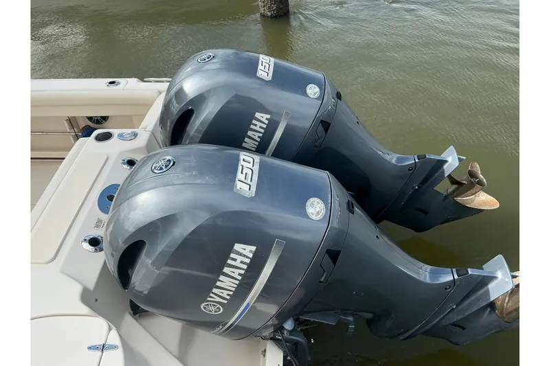 Slide: The Image of Twin Yamaha 150 outboard engines on a 2020 Grady-White Freedom 225 boat. - 5