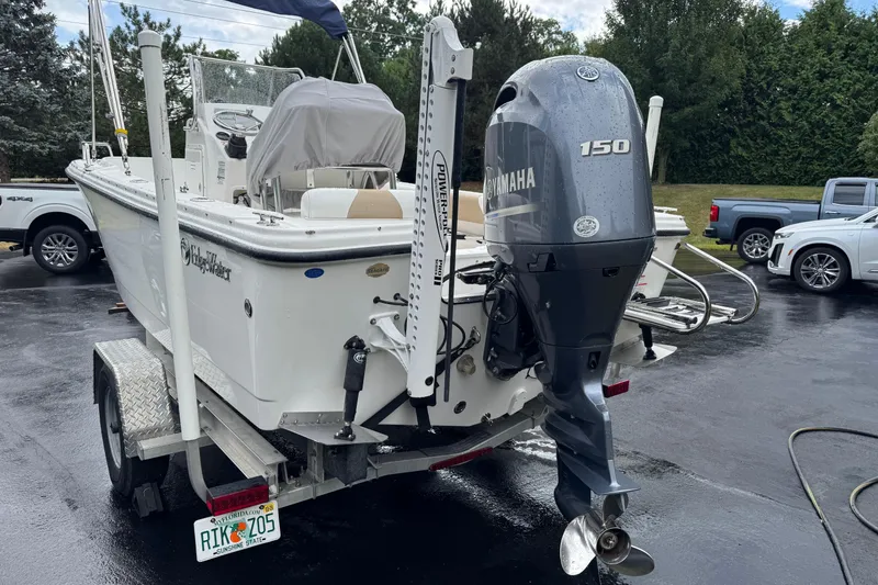 Slide: The Image of 2019 Edgewater 188CC boat with Yamaha 150 engine on a trailer. - 4