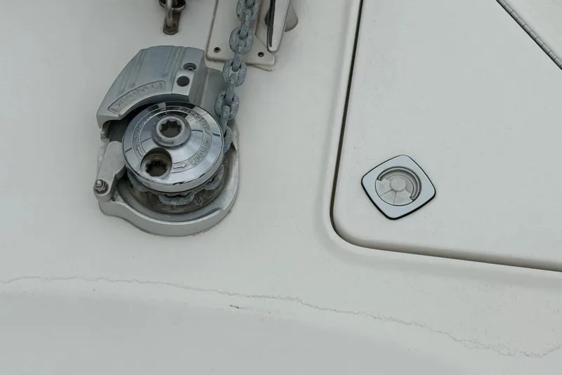 Slide: The Image of Anchor windlass on 2001 Sea Ray 340 Sundancer boat deck. - 24
