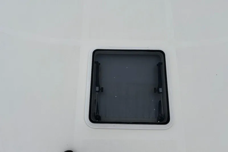 Slide: The Image of Hatch on 2001 Sea Ray 340 Sundancer boat deck, closed and secured. - 29