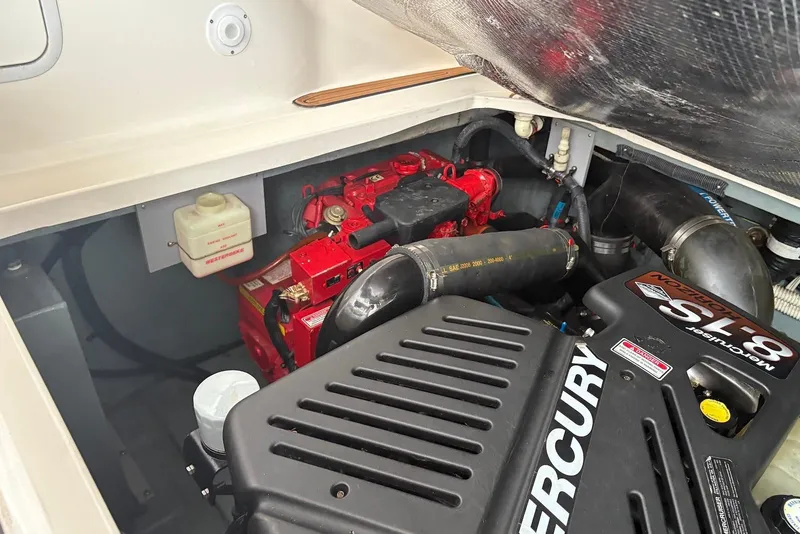 Slide: The Image of Engine compartment of a 2001 Sea Ray 340 Sundancer with Mercury components visible. - 37