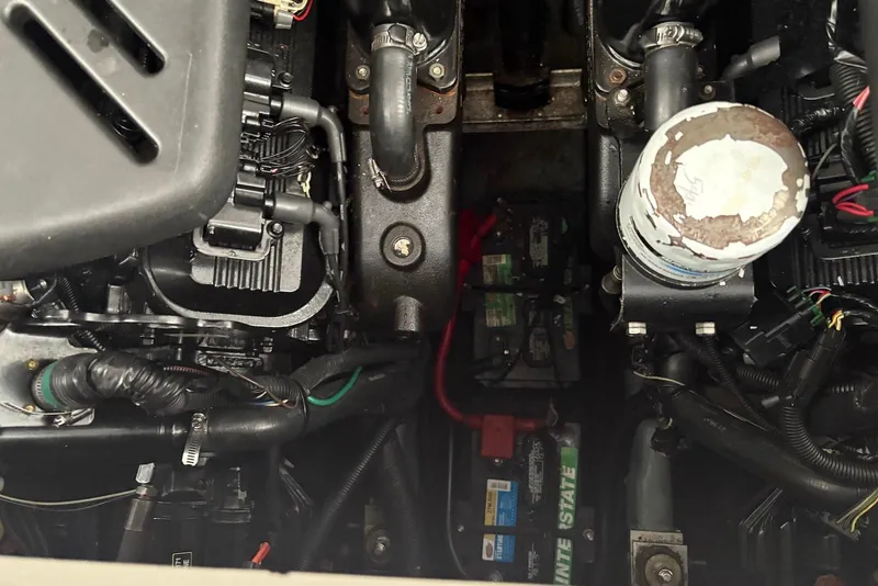 Slide: The Image of Engine compartment of a 2001 Sea Ray 340 Sundancer boat, showing mechanical components. - 41