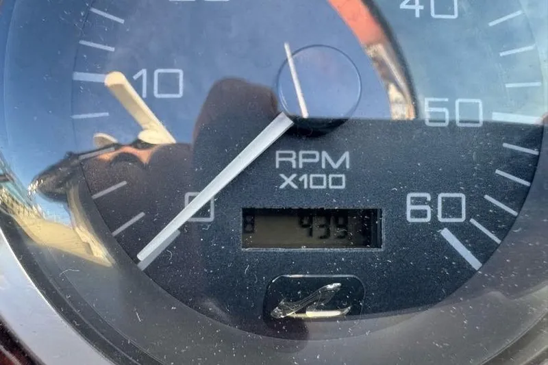 Slide: The Image of Close-up of a 2001 Sea Ray 380 Sundancer RPM gauge showing 4350 RPM. - 23