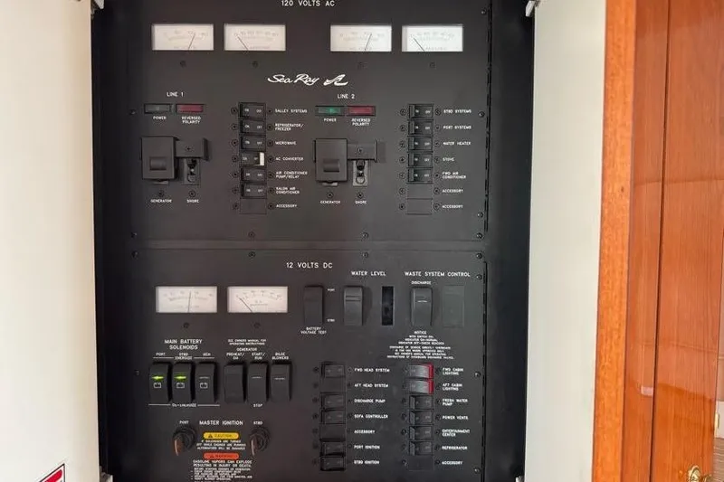 Slide: The Image of Electrical control panel on a 2001 Sea Ray 380 Sundancer boat. - 24
