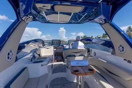 Slide: The Image of 2024 Hanover 305 White & Blue Edition boat interior with luxurious seating and modern design. - 5
