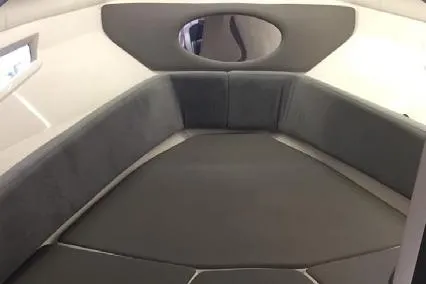 Slide: The Image of Interior of 2025 Hanover 305 Black & Orange Edition boat, featuring sleek seating and modern design. - 4