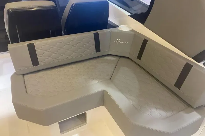 Slide: The Image of Luxurious seating in 2026 Hanover 387 Tuxedo Luxury Edition boat interior. - 4