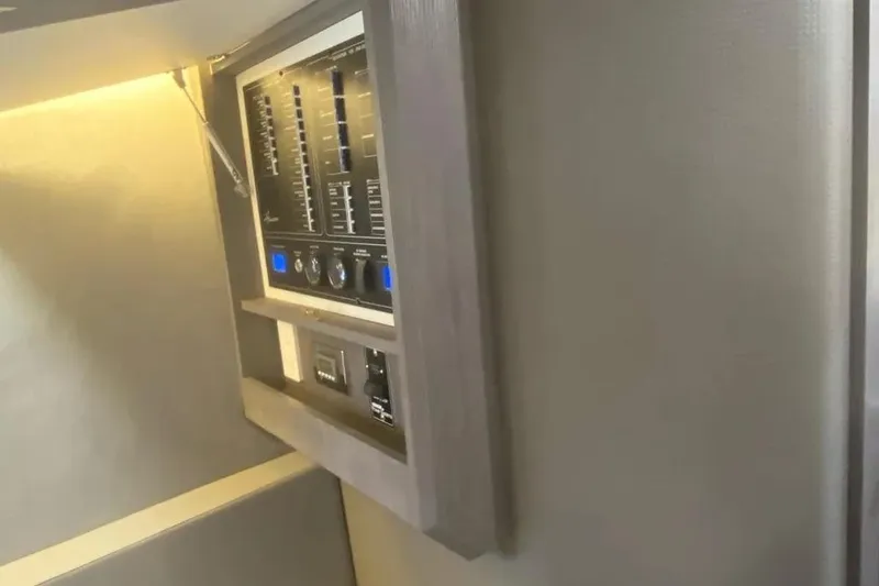 Slide: The Image of Control panel inside 2026 Hanover 387 Tuxedo Luxury Edition RV, featuring modern design and lighting. - 7