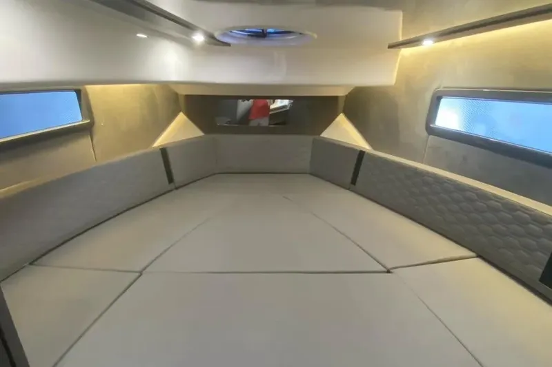 Slide: The Image of Interior of 2026 Hanover 387 Tuxedo Luxury Edition boat, featuring elegant seating and ambient lighting. - 8