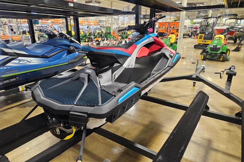 Slide: The Image of 2025 Yamaha WaveRunner Jet Blaster DLX 3 Pass on display in showroom. - 2