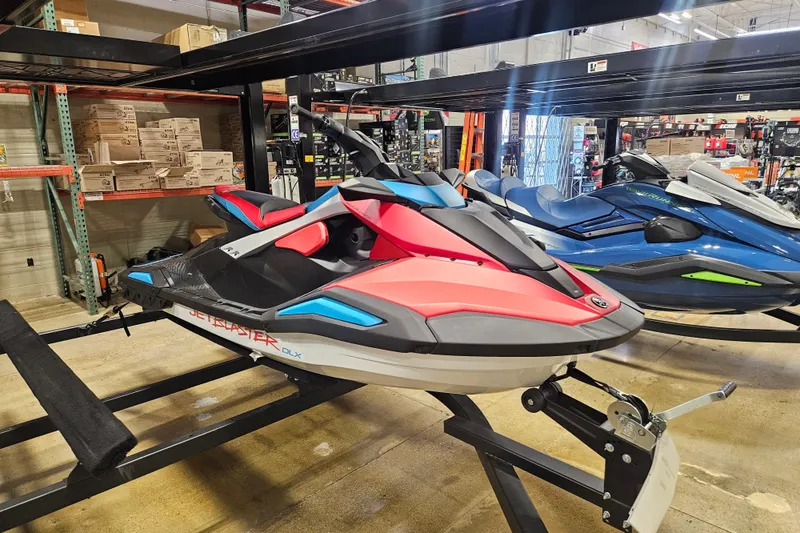 Slide: The Image of 2025 Yamaha WaveRunner Jet Blaster DLX 3 Pass on display in showroom. - 4