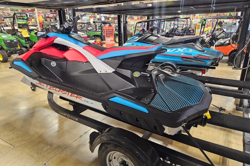 Slide: The Image of 2025 Yamaha WaveRunner Jet Blaster DLX 3 Pass on display in showroom. - 5